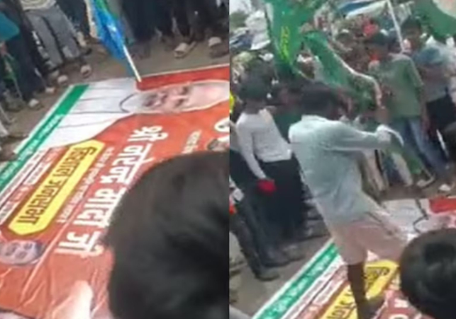 Video of him walking on PM Modi poster goes viral
