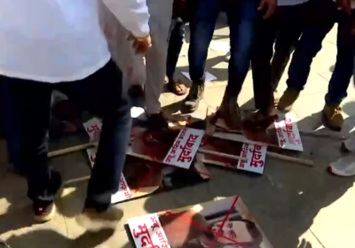 Abu Azmi poster was kicked and beaten