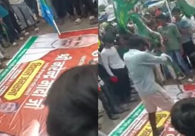 Video of him walking on PM Modi poster goes viral